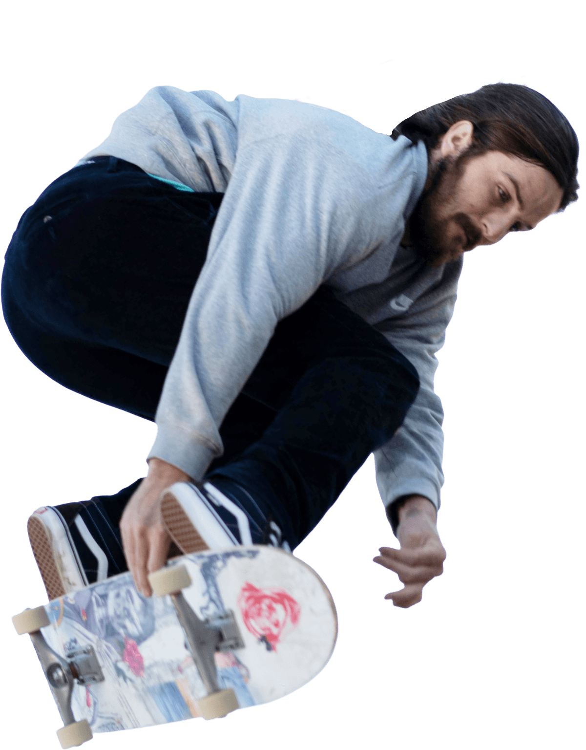 Skateboarder performing a trick with a custom skateboard deck